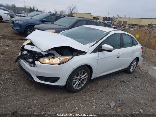 Photo 1 VIN: 1FADP3F2XFL291188 - FORD FOCUS 