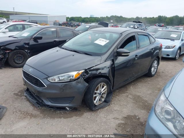 Photo 1 VIN: 1FADP3F2XFL293216 - FORD FOCUS 