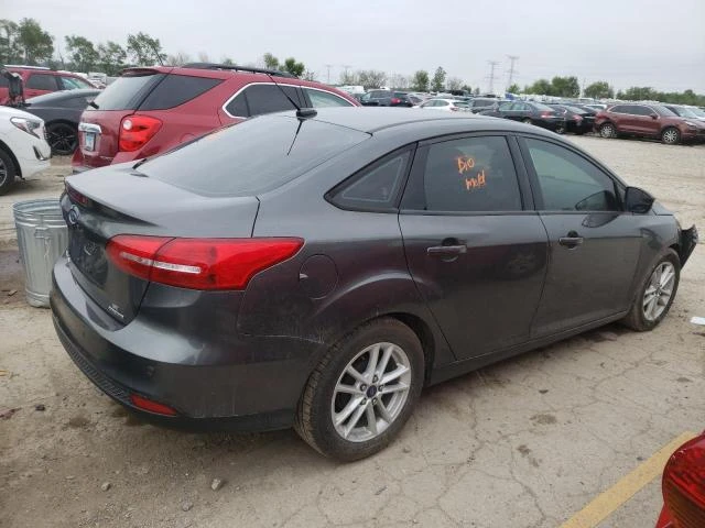 Photo 2 VIN: 1FADP3F2XFL299906 - FORD FOCUS SE 