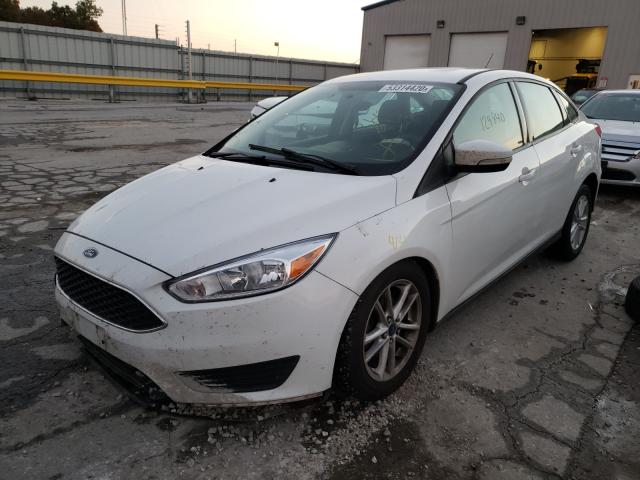 Photo 1 VIN: 1FADP3F2XFL301668 - FORD FOCUS SE 