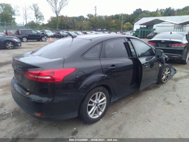 Photo 3 VIN: 1FADP3F2XFL301671 - FORD FOCUS 