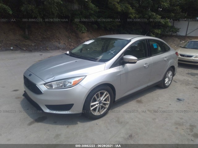 Photo 1 VIN: 1FADP3F2XFL317174 - FORD FOCUS 