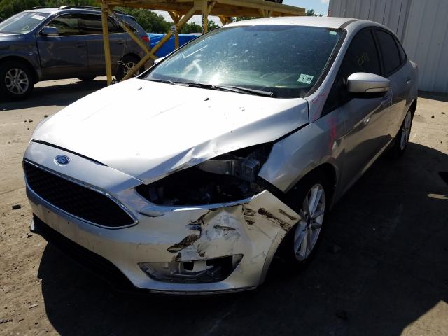 Photo 1 VIN: 1FADP3F2XFL317238 - FORD FOCUS SE 