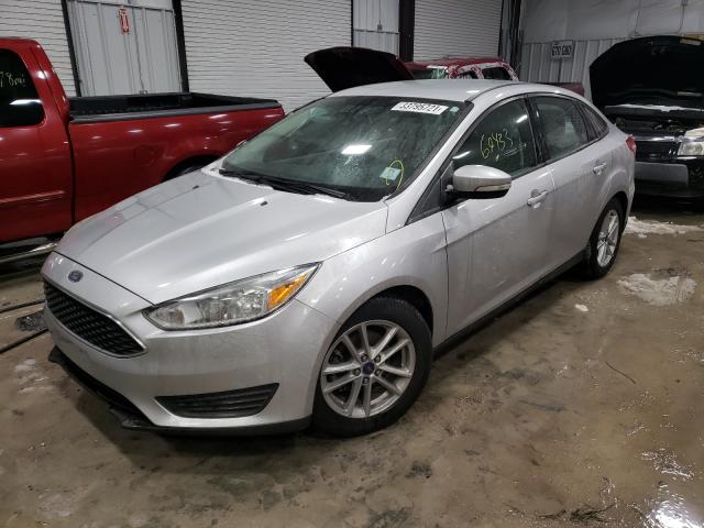 Photo 1 VIN: 1FADP3F2XFL336999 - FORD FOCUS SE 