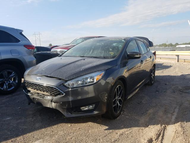 Photo 1 VIN: 1FADP3F2XFL368707 - FORD FOCUS SE 