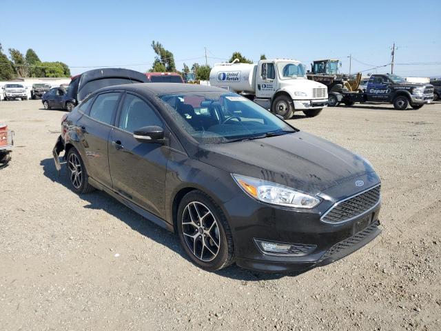 Photo 3 VIN: 1FADP3F2XFL369971 - FORD FOCUS SE 