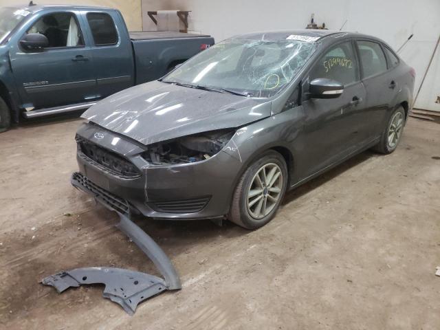 Photo 1 VIN: 1FADP3F2XFL374121 - FORD FOCUS SE 