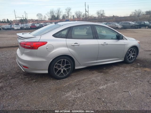 Photo 3 VIN: 1FADP3F2XFL378072 - FORD FOCUS 