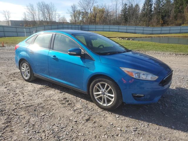 Photo 3 VIN: 1FADP3F2XFL381098 - FORD FOCUS SE 