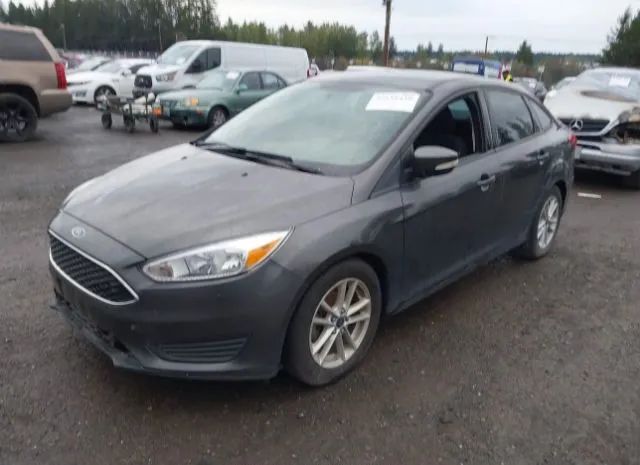 Photo 1 VIN: 1FADP3F2XFL385930 - FORD FOCUS 