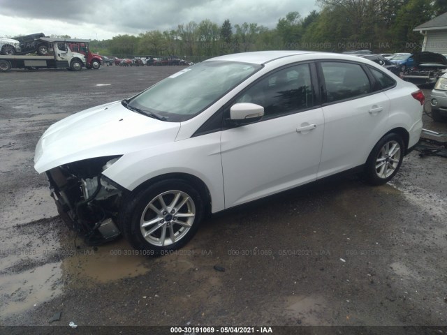 Photo 1 VIN: 1FADP3F2XGL207968 - FORD FOCUS 