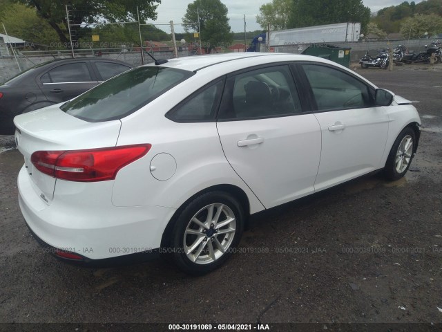 Photo 3 VIN: 1FADP3F2XGL207968 - FORD FOCUS 