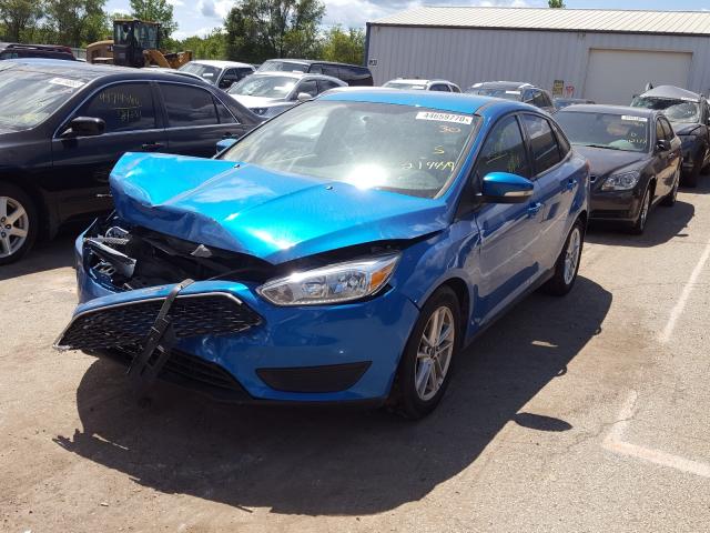 Photo 1 VIN: 1FADP3F2XGL214449 - FORD FOCUS SE 