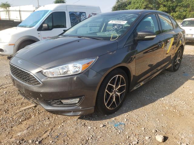 Photo 1 VIN: 1FADP3F2XGL216122 - FORD FOCUS SE 