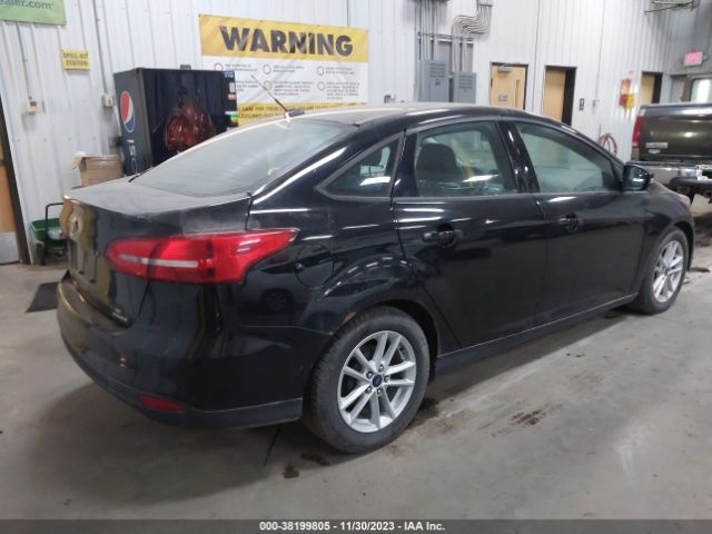 Photo 3 VIN: 1FADP3F2XGL216962 - FORD FOCUS 