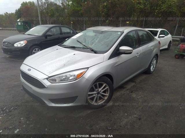 Photo 1 VIN: 1FADP3F2XGL223698 - FORD FOCUS 