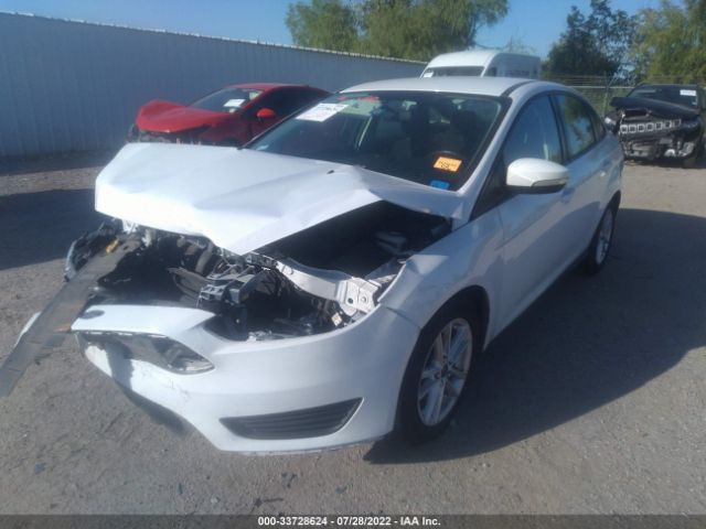 Photo 1 VIN: 1FADP3F2XGL230263 - FORD FOCUS 