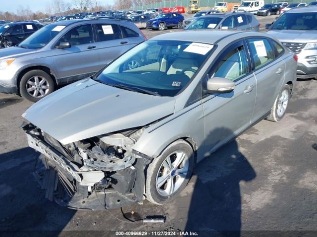 Photo 1 VIN: 1FADP3F2XGL240792 - FORD FOCUS 