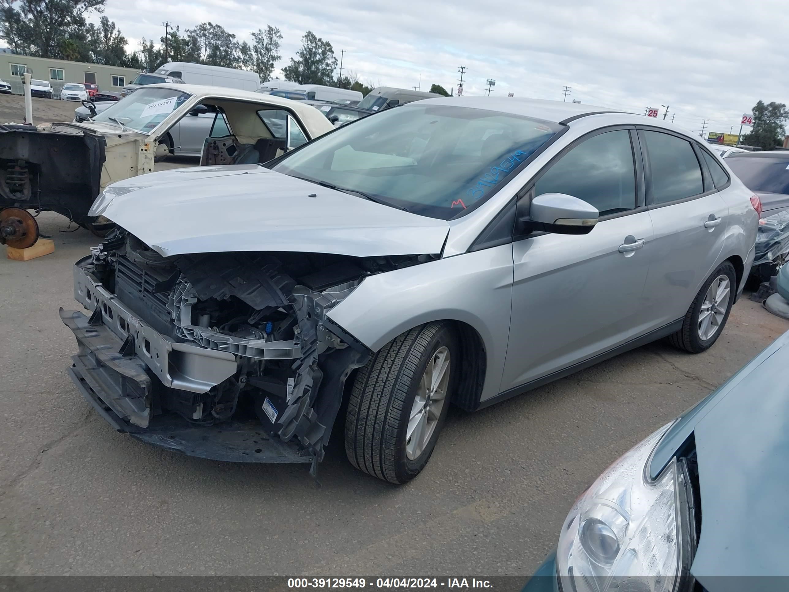 Photo 1 VIN: 1FADP3F2XGL255924 - FORD FOCUS 