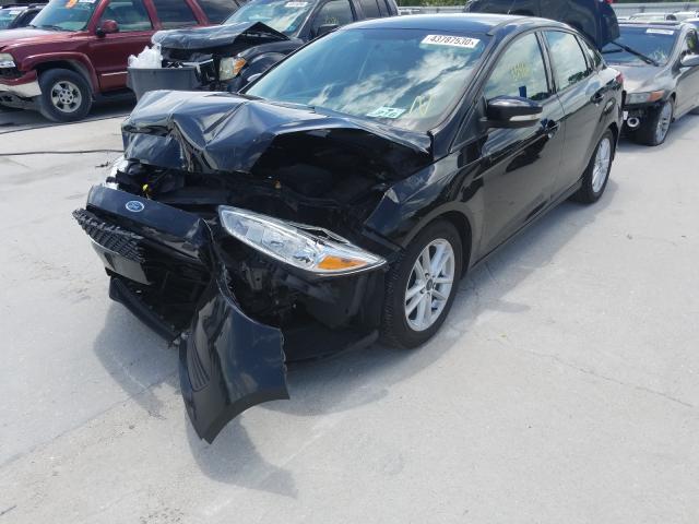 Photo 1 VIN: 1FADP3F2XGL256152 - FORD FOCUS 