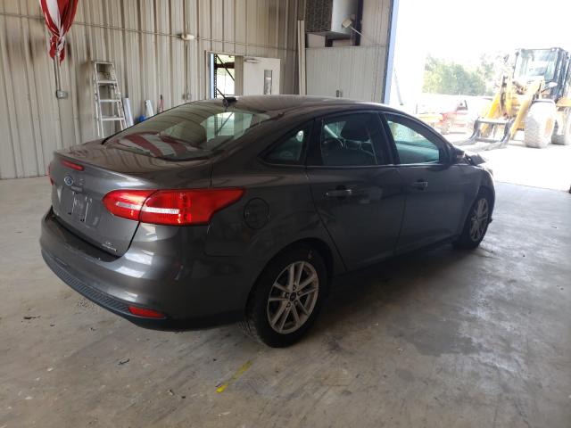 Photo 3 VIN: 1FADP3F2XGL259276 - FORD FOCUS SE 