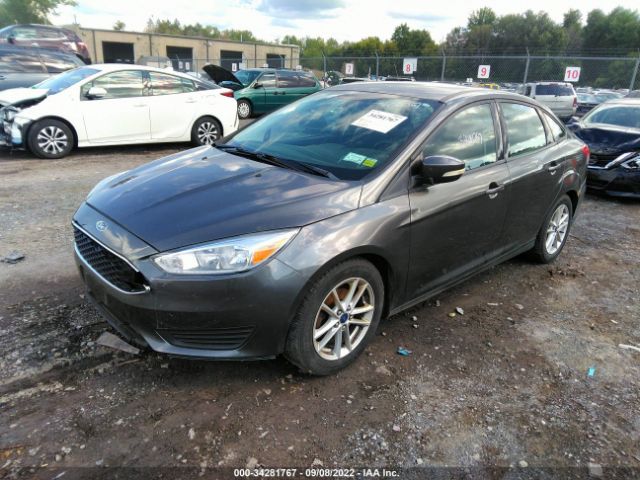 Photo 1 VIN: 1FADP3F2XGL261027 - FORD FOCUS 