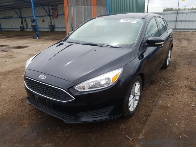 Photo 1 VIN: 1FADP3F2XGL263599 - FORD FOCUS SE 