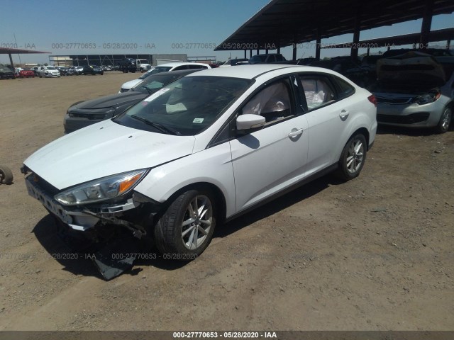 Photo 1 VIN: 1FADP3F2XGL271587 - FORD FOCUS 