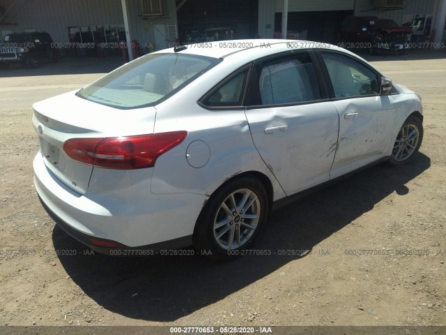 Photo 3 VIN: 1FADP3F2XGL271587 - FORD FOCUS 