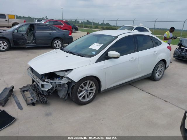 Photo 1 VIN: 1FADP3F2XGL272626 - FORD FOCUS 