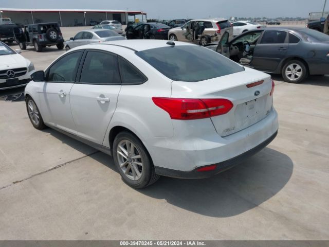 Photo 2 VIN: 1FADP3F2XGL272626 - FORD FOCUS 