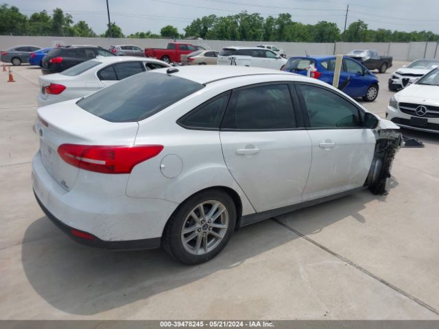 Photo 3 VIN: 1FADP3F2XGL272626 - FORD FOCUS 