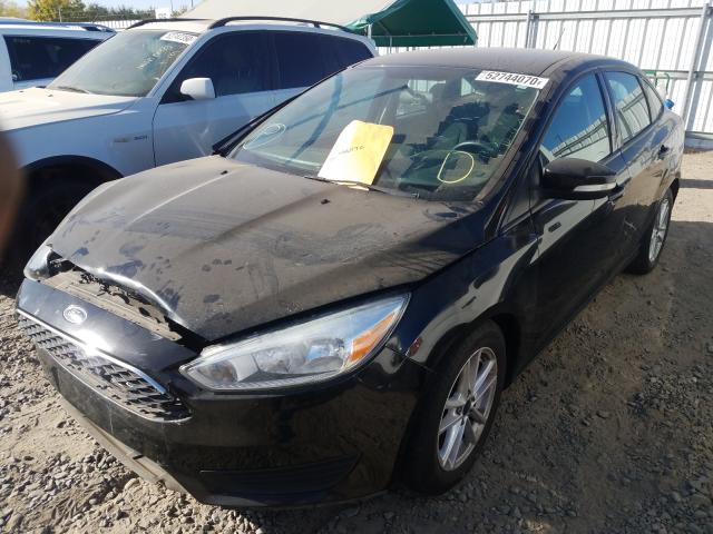 Photo 1 VIN: 1FADP3F2XGL286686 - FORD FOCUS 