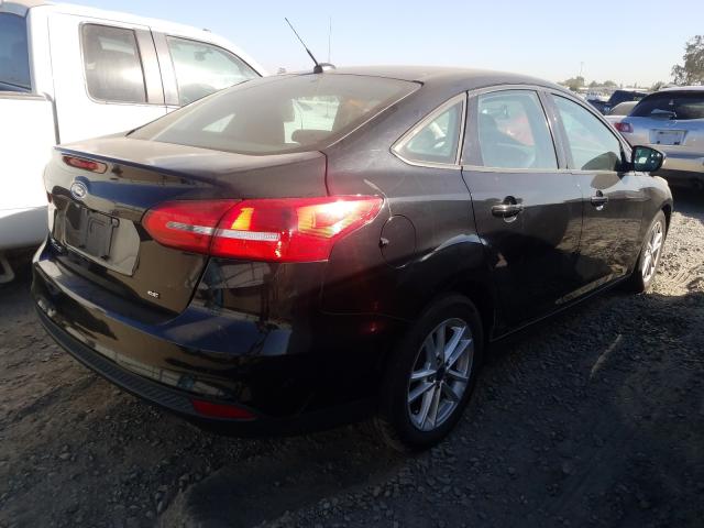 Photo 3 VIN: 1FADP3F2XGL286686 - FORD FOCUS 