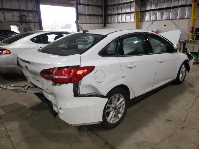 Photo 3 VIN: 1FADP3F2XGL301817 - FORD FOCUS SE 