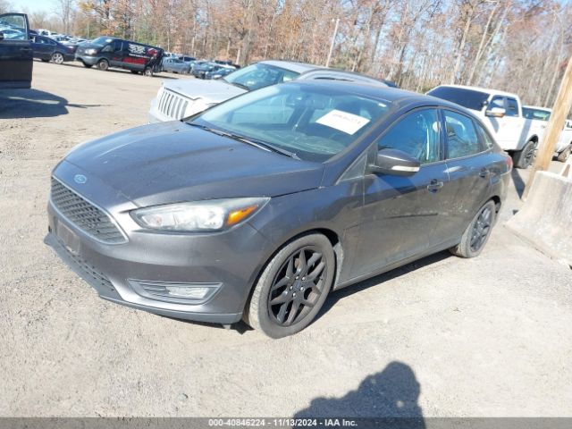 Photo 1 VIN: 1FADP3F2XGL304927 - FORD FOCUS 