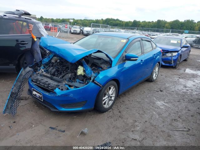 Photo 1 VIN: 1FADP3F2XGL305303 - FORD FOCUS 