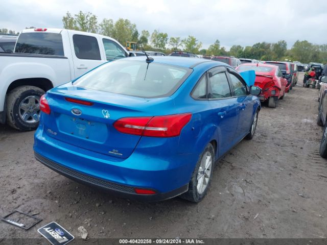 Photo 3 VIN: 1FADP3F2XGL305303 - FORD FOCUS 