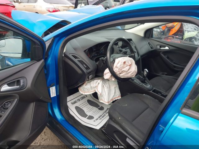 Photo 4 VIN: 1FADP3F2XGL305303 - FORD FOCUS 