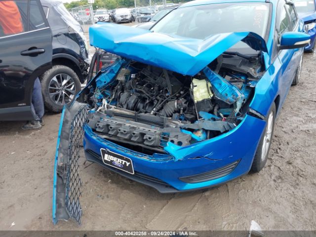 Photo 5 VIN: 1FADP3F2XGL305303 - FORD FOCUS 