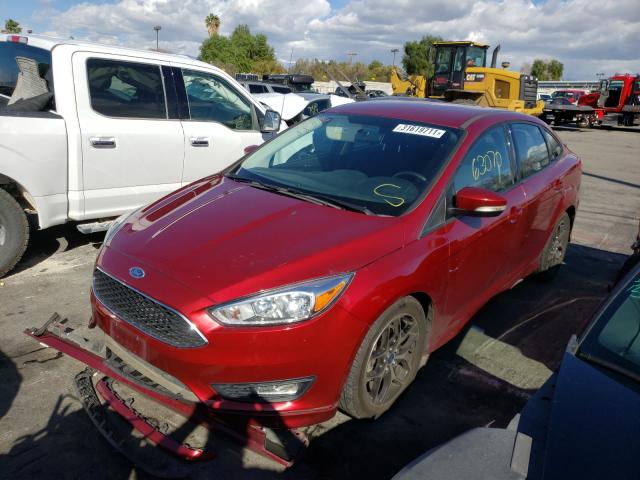 Photo 1 VIN: 1FADP3F2XGL310579 - FORD FOCUS SE 