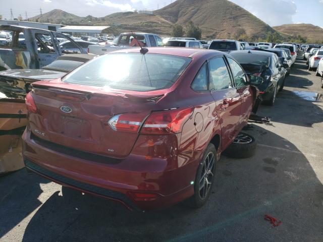 Photo 3 VIN: 1FADP3F2XGL310579 - FORD FOCUS SE 