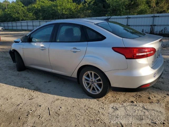 Photo 1 VIN: 1FADP3F2XGL310906 - FORD FOCUS 