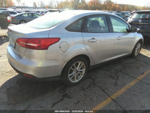 Photo 3 VIN: 1FADP3F2XGL312364 - FORD FOCUS 