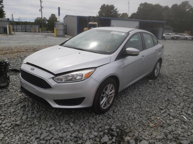 Photo 1 VIN: 1FADP3F2XGL313594 - FORD FOCUS SE 