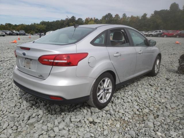 Photo 3 VIN: 1FADP3F2XGL313594 - FORD FOCUS SE 