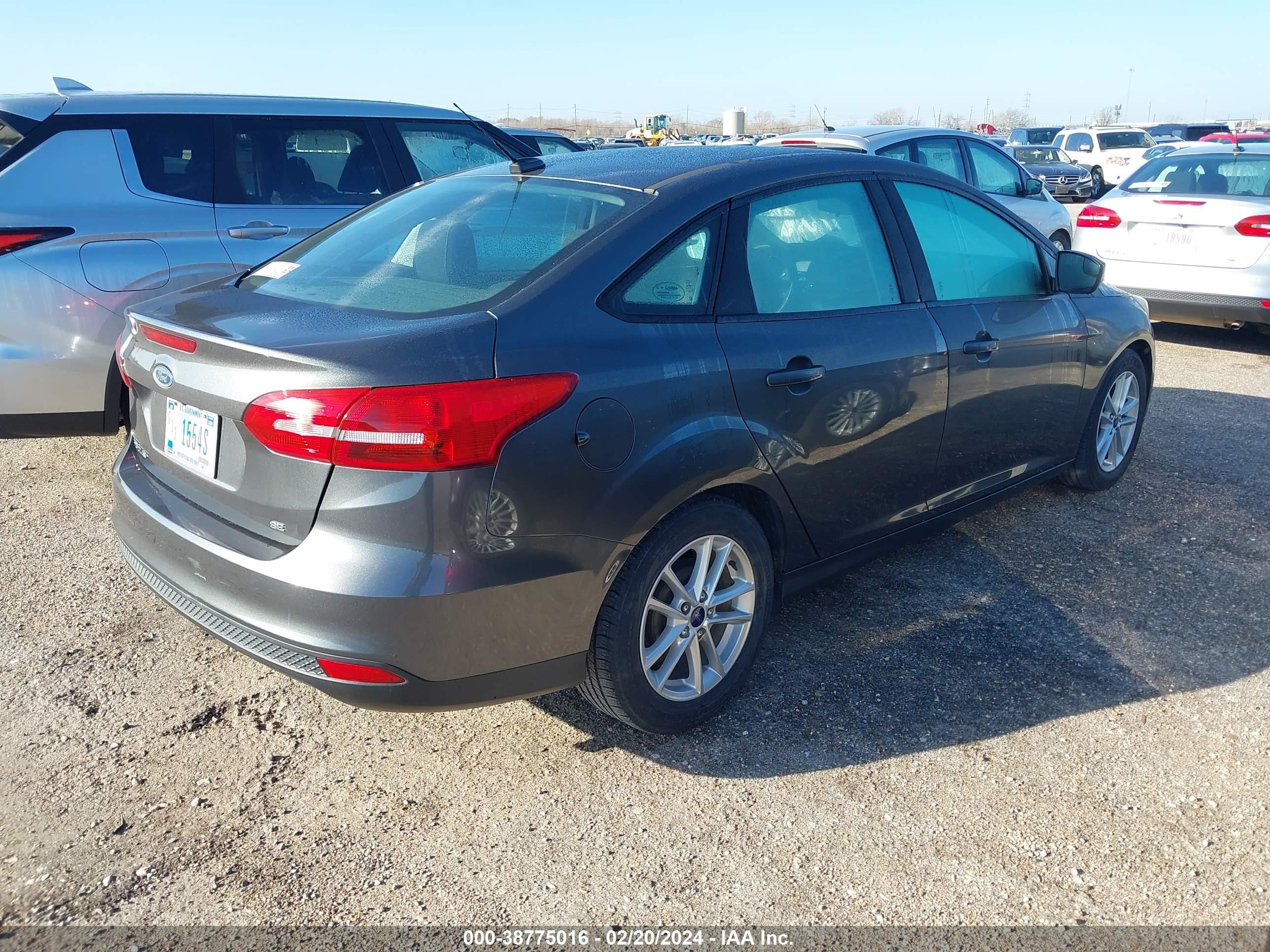 Photo 3 VIN: 1FADP3F2XGL321999 - FORD FOCUS 