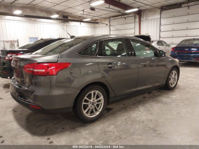 Photo 3 VIN: 1FADP3F2XGL322229 - FORD FOCUS 