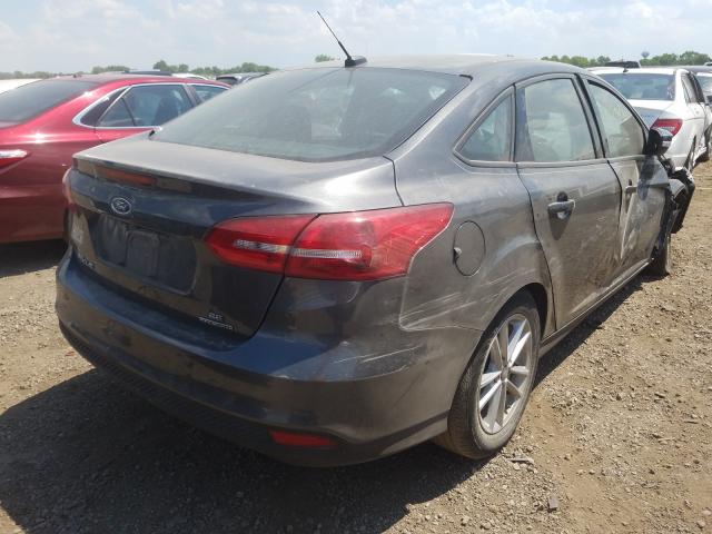 Photo 3 VIN: 1FADP3F2XGL323655 - FORD FOCUS SE 