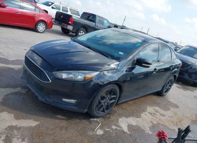 Photo 1 VIN: 1FADP3F2XGL328676 - FORD FOCUS 